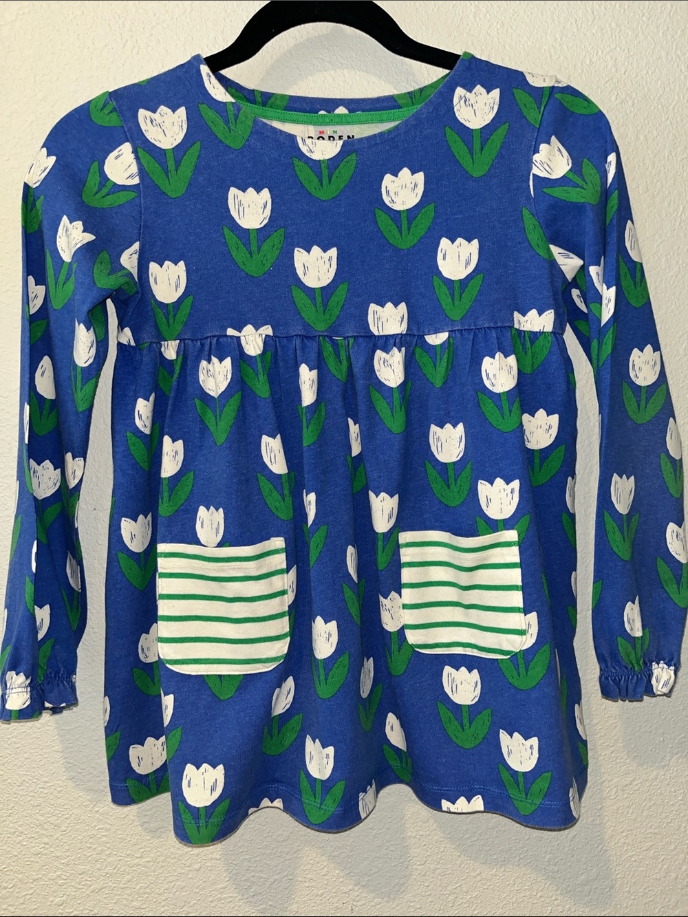Mini Boden GirlsTunic Top
Blue Tulip Print Long Sleeves, Striped Pockets
Y 9-10
